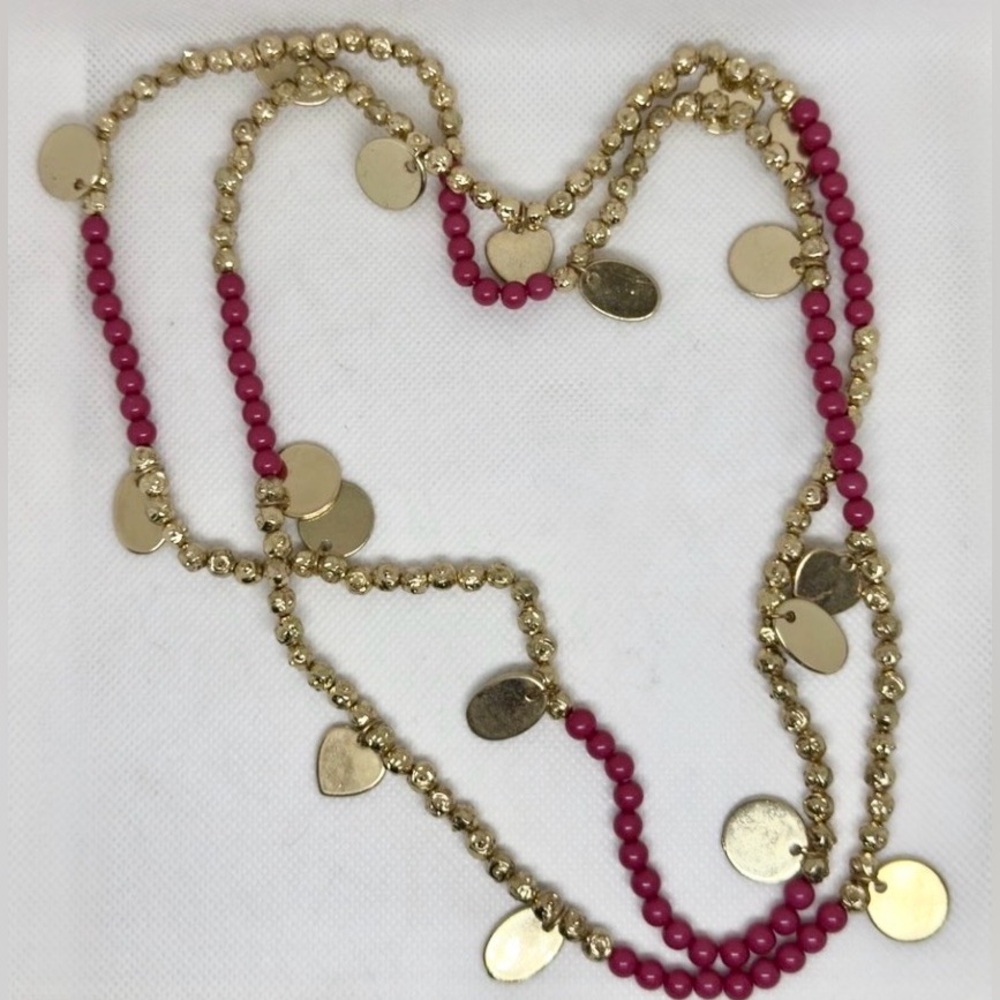 Gold tone & red long beaded charm necklace w/hearts, circles & ovals